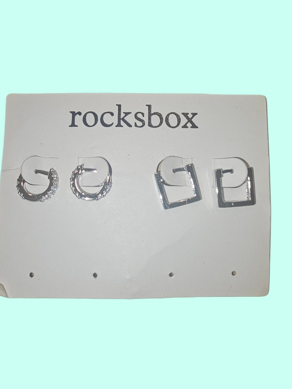 Elevate your style with the Rocksbox Silver Hoop & Square Stud Earring Set! ✨